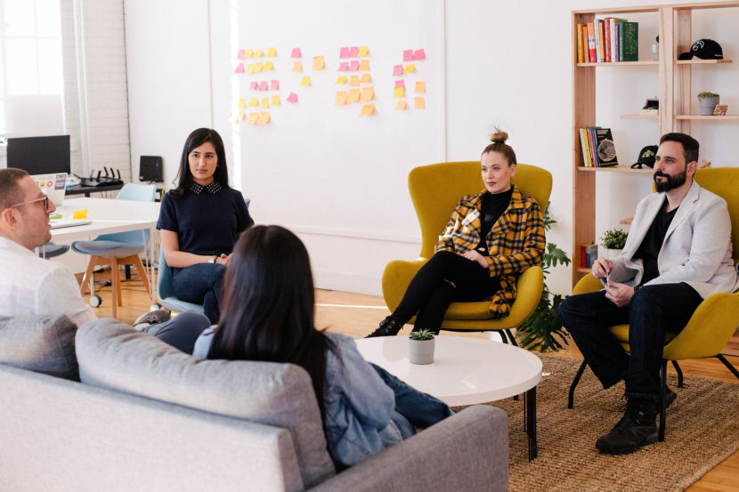 several people having a ux meeting in an office